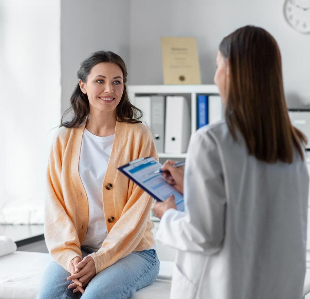 Clinician discussing a health assessment with a patient